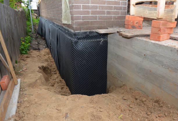 Happy homeowners after waterproofing job in Walhalla